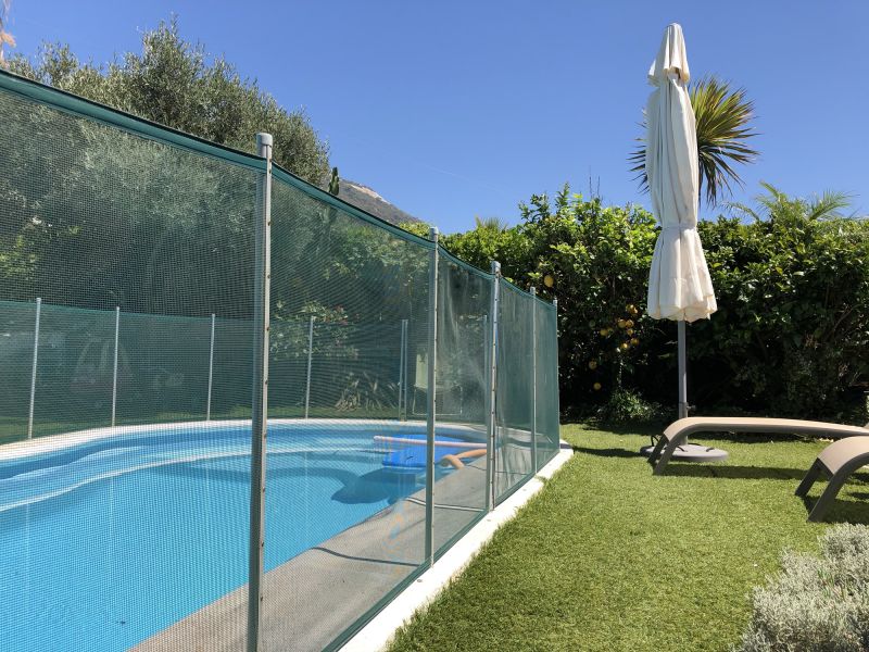 Pool Area with Mesh Barrier